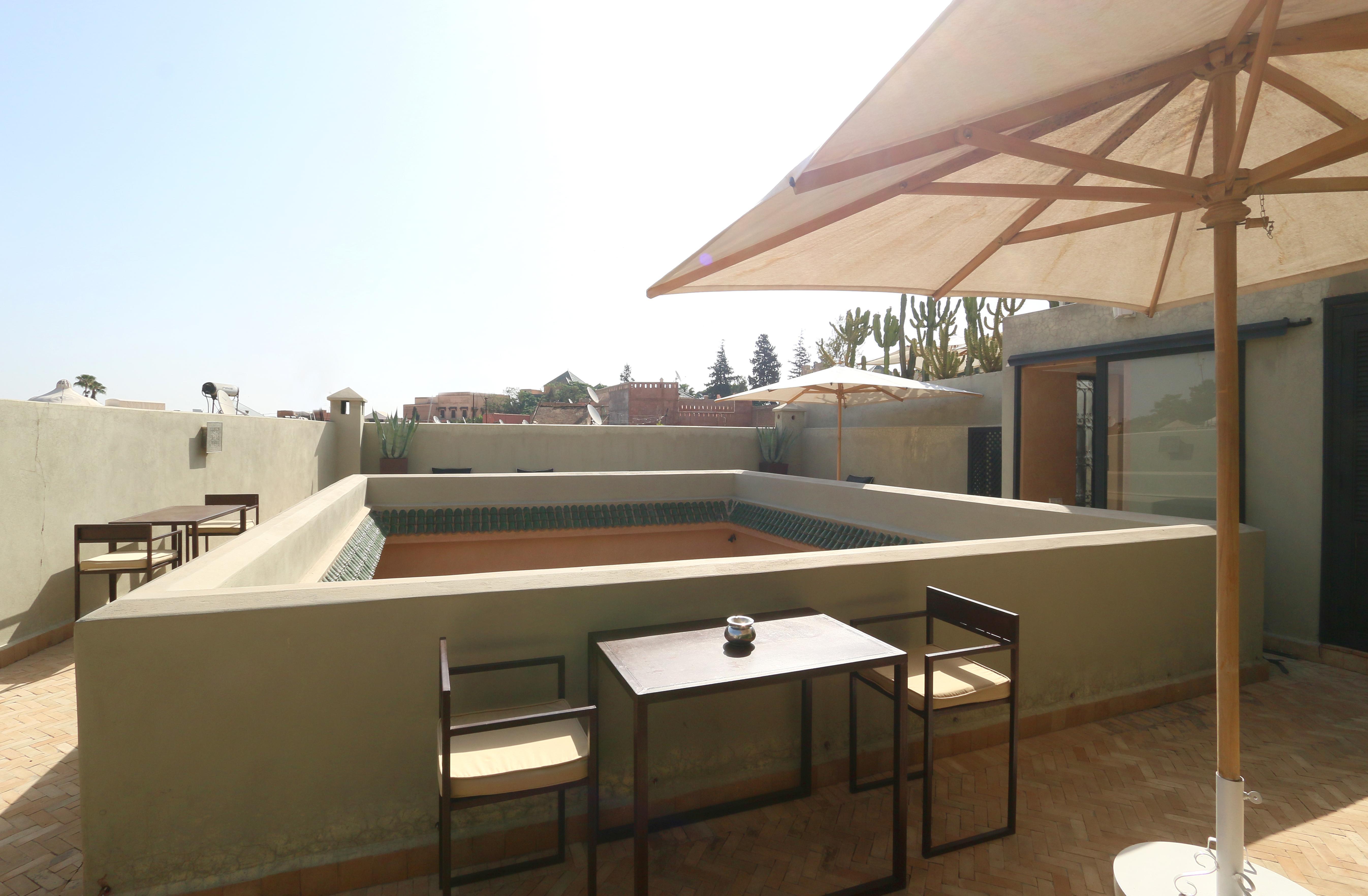 Ambre Epices Medina Riad Marrakesh Exterior photo Rooftop terrace