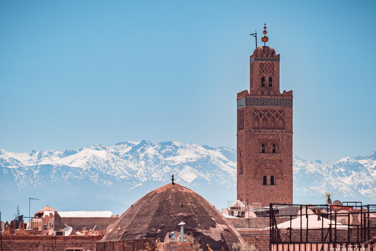 Ambre Epices Medina Riad Marrakesh Exterior photo The minaret of the Kutubiyya Mosque in Marrakech