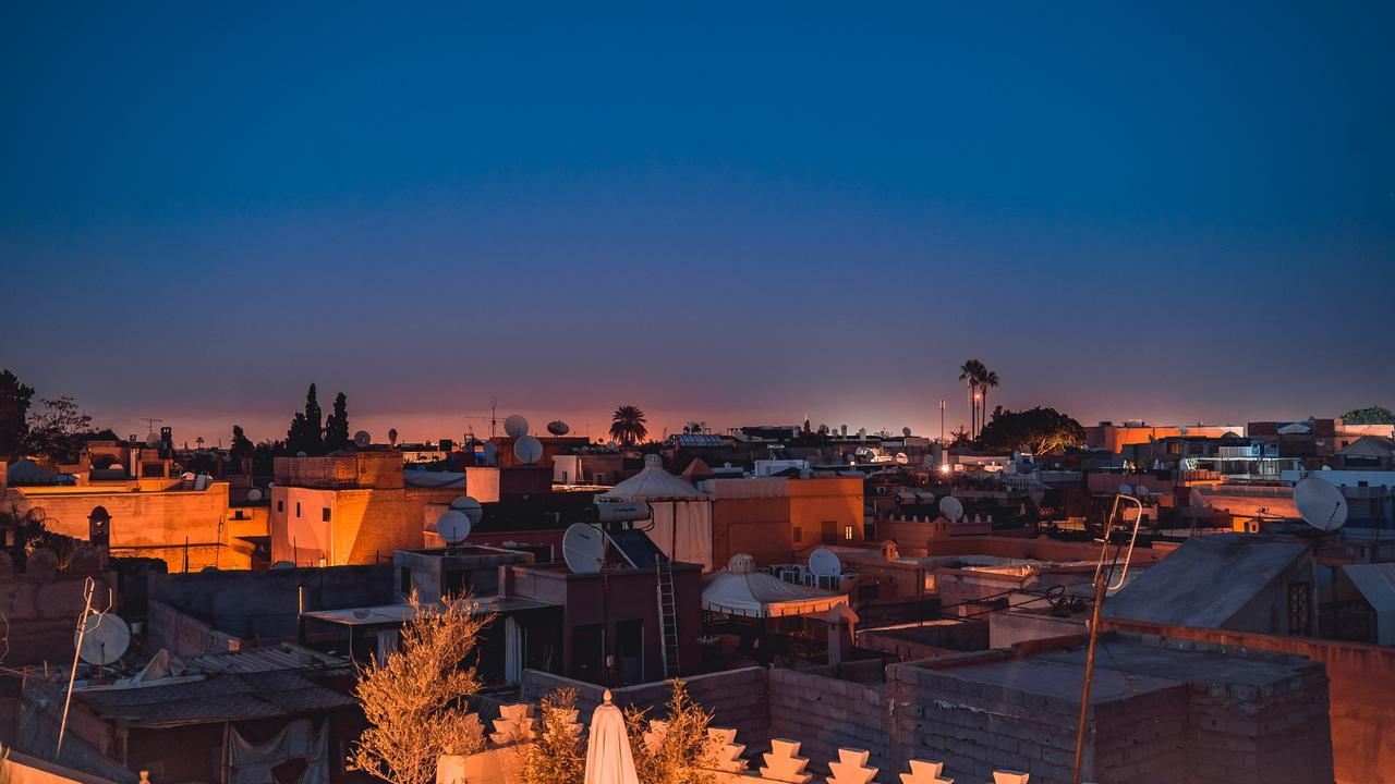 Ambre Epices Medina Riad Marrakesh Exterior photo Sunset over the city of Marrakech